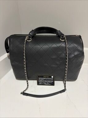 CHANEL Black Quilted Leather Bowling Shoulder Bag with Chain Strap